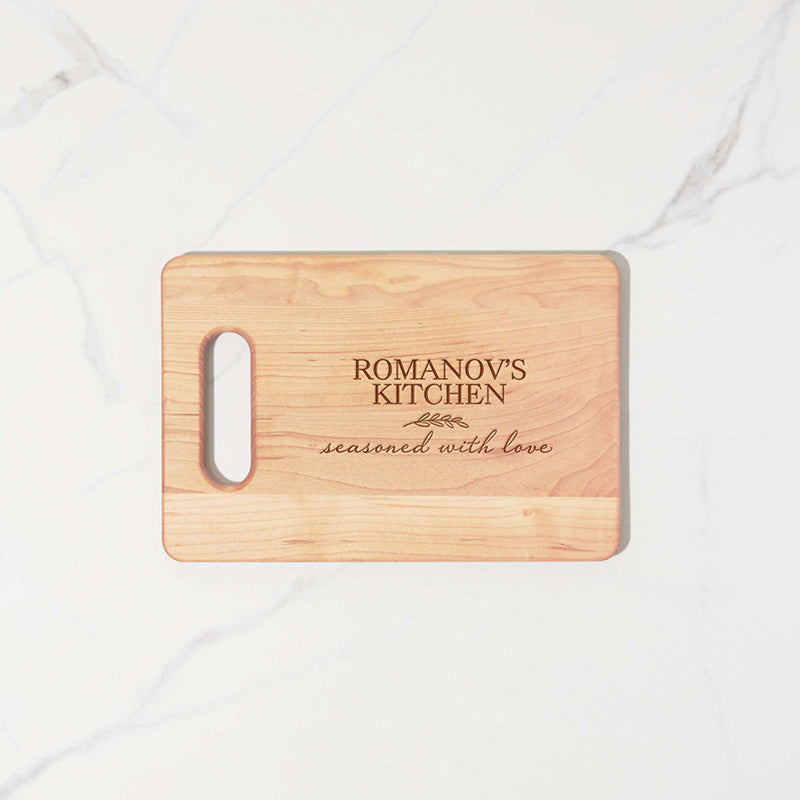 https://www.personalizedgallery.com/cdn/shop/products/Personalized-small-cutting-board-SEASONED-WITH-LOVE-7_4ab6b52d-46d5-4f00-a8aa-43c87da6ded4_2048x.jpg?v=1649804606