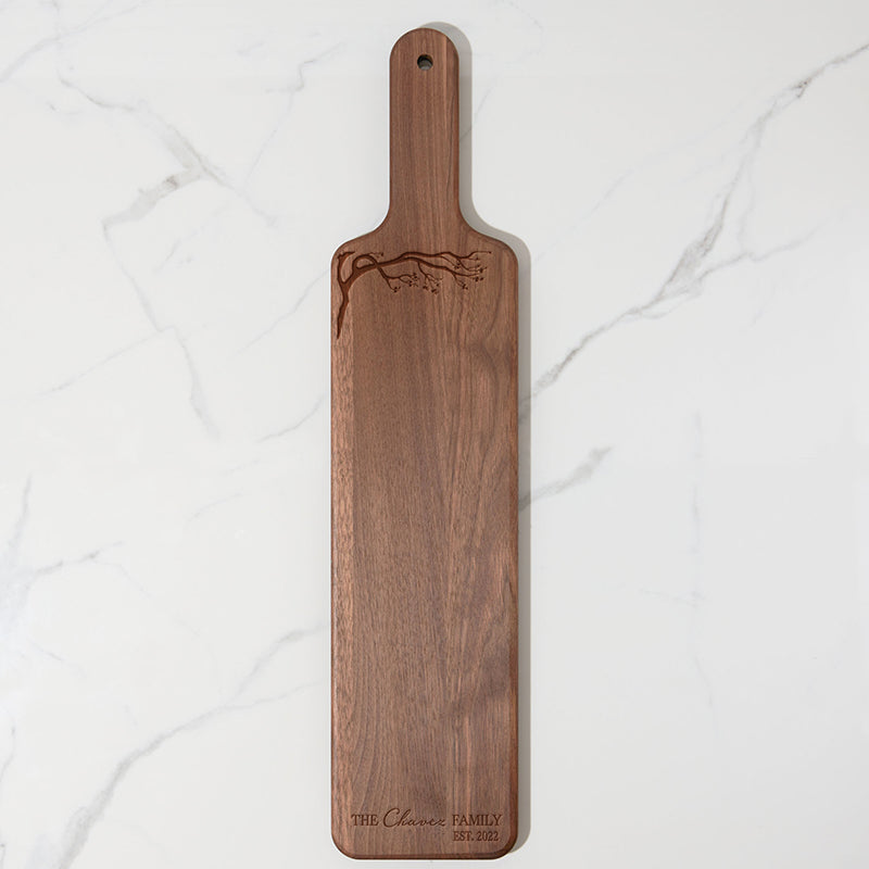 https://www.personalizedgallery.com/cdn/shop/products/walnut-long-cutting-board-Trees_2048x.jpg?v=1651081850